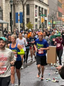 Road full of runners in city
