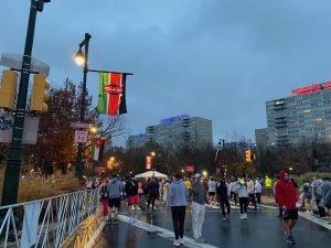 Rainy early morning in Philly, people on the streets, cloudy sky
